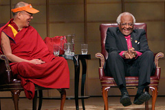 Nobel Peace Prize Laureate Archbishop Desmond Tutu, who has called for military intervention to topple the Mugabe government, with another bogus advocate of peace, the Dalai Lama.