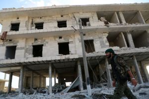 Wreckage of Manbij in the wake of US coalition airstrikes, June 23, 2016 (AFP Photo/Delil Souleiman)